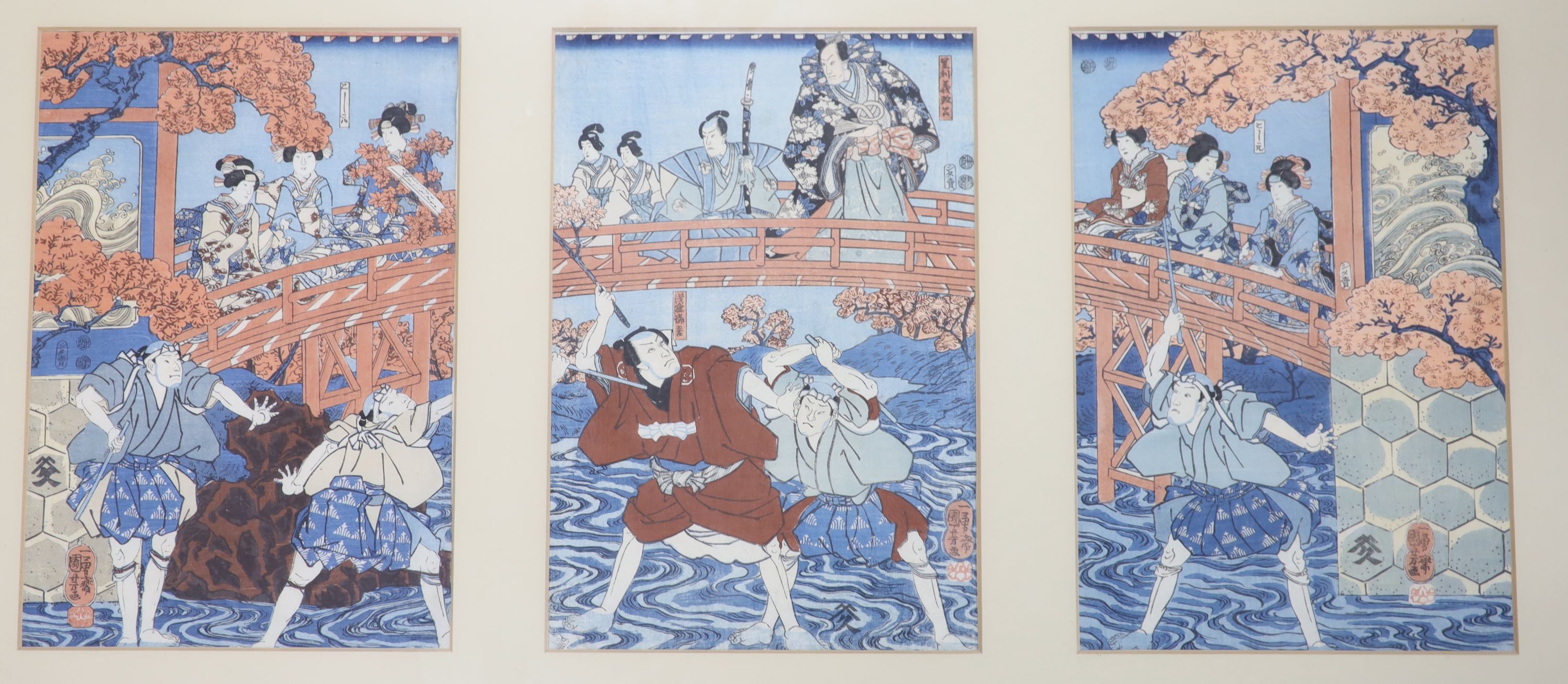 Kuniyoshi (1797-1861), three woodblock prints, Figures on a bridge, each 36 x 24cm, framed as one